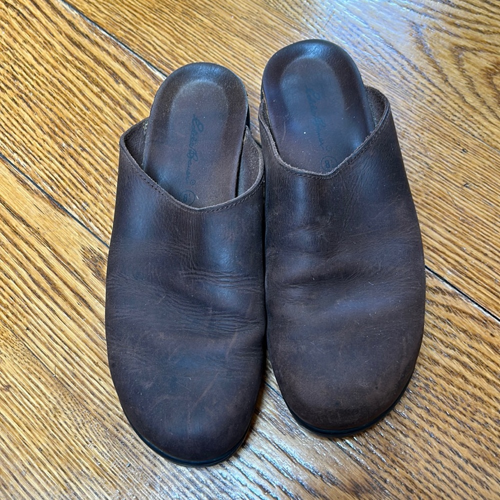 Eddie Bauer brown leather mules.  Size 8.5.  Cork soles. Fair condition.